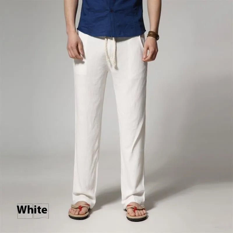 Men's straight leg casual trousers in cotton linen blend fabric showing loose fit and zip fly closure