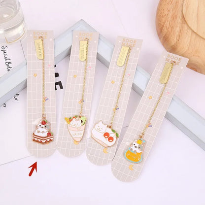 Jane Lime Foodie cat creative metal bookmark with cartoon pendant on a book page.