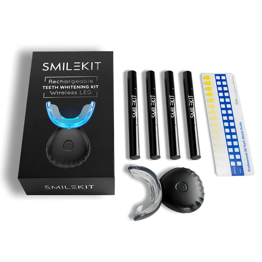 Wireless teeth whitening lamp kit in black charging suit with mint gel for portable stain cleaning