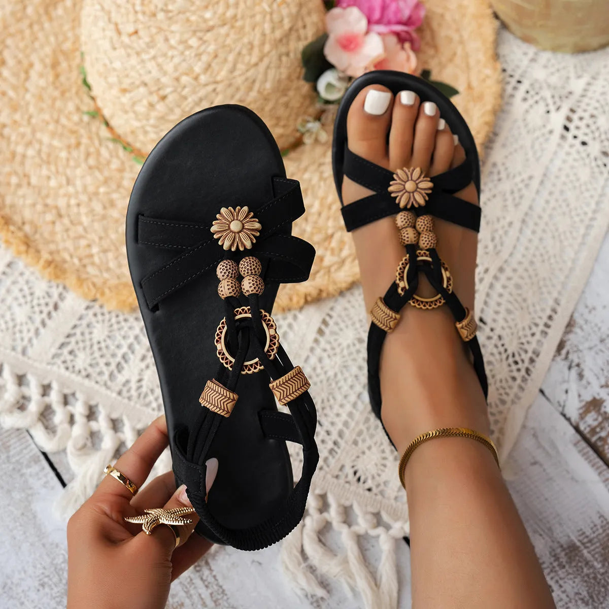 Black ethnic style women's beach sandals with beaded weave, rhinestone decoration, and elastic band closure
