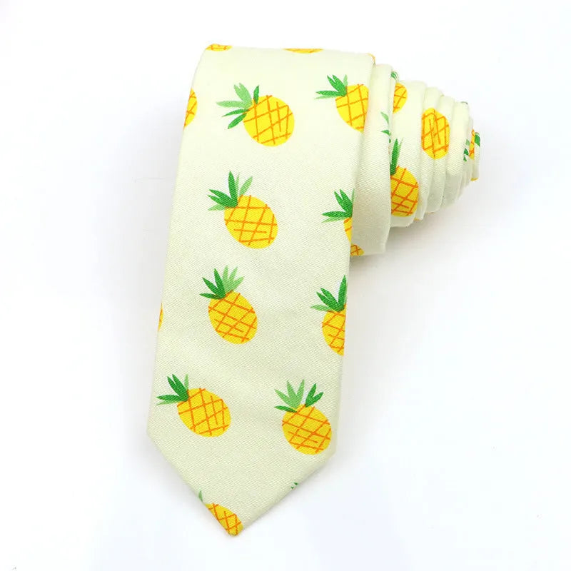 A narrow Korean-style cotton bow tie featuring a cartoon print, shown in a selection of colours.