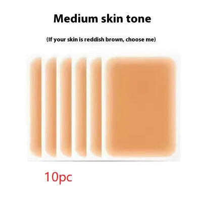 Tattoo cover patch and a 130mm long concealer brush on a table, with colour option swatches visible.