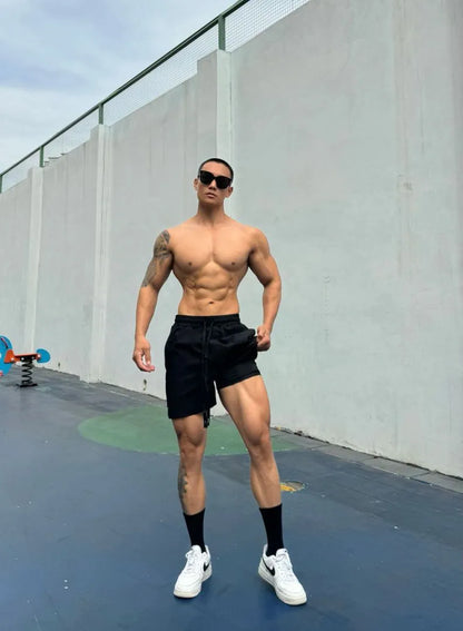 Men's ice silk quick-drying double-layer shorts in quarter-length design with nylon fabric