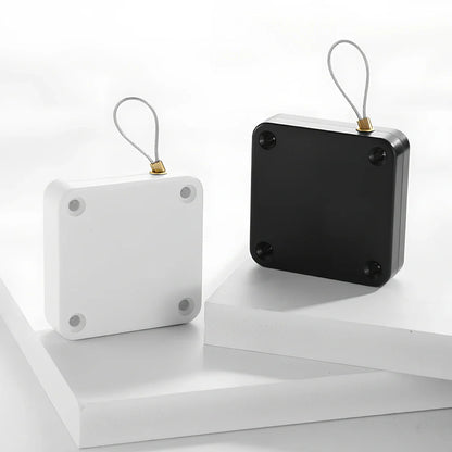 Punch-free automatic retractable sliding door security device with anti-theft cable box measuring 63x63x18mm