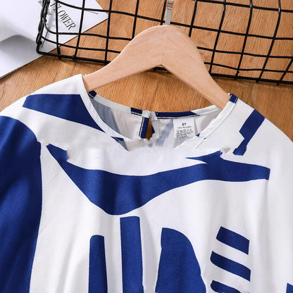 Black and white zebra print short sleeve top with matching wide leg shorts for youth summer wear