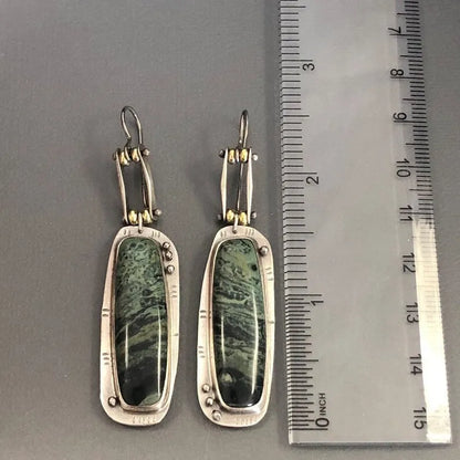 Two-tone geometric alloy earrings with marble pattern, lightweight design for all-day wear