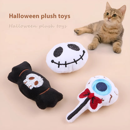 Plush cat teaser wand with candy, eyes, and skull heads on a 40cm string next to a wand handle.