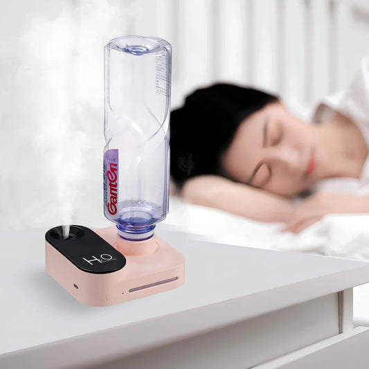 Green mineral water bottle style USB humidifier measuring 100mm with single mist outlet