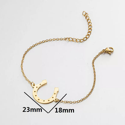 Punk Horse Shoe Chain Bracelet in gold and steel colors, featuring a unique U-shape charm