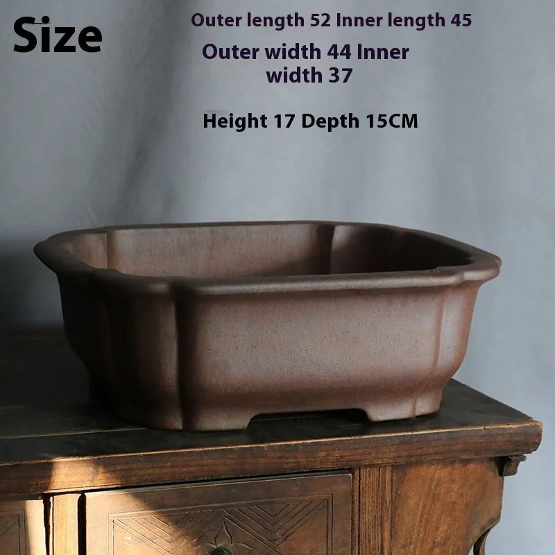 Purple sand rectangular bonsai flower pot measuring 25cm long with natural clay texture