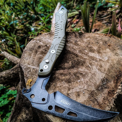 Folding outdoor axe with tool steel blade in army green, showing 35cm extended and 26cm folded positions with nylon sheath