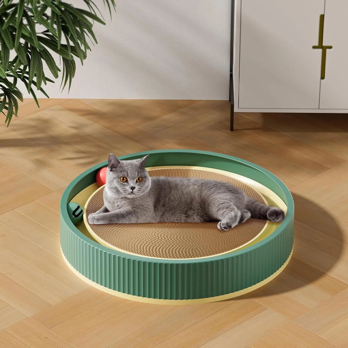 Green cat scratching board with 45cm diameter, high-density cardboard, and integrated ball toys for indoor cats
