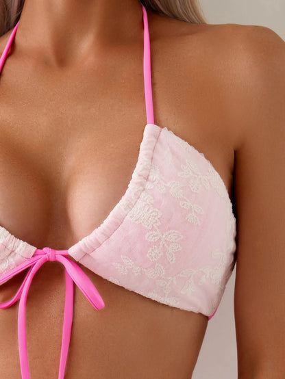 Pink lace crochet halter swimsuit with briefs bottom and lace-up detailing