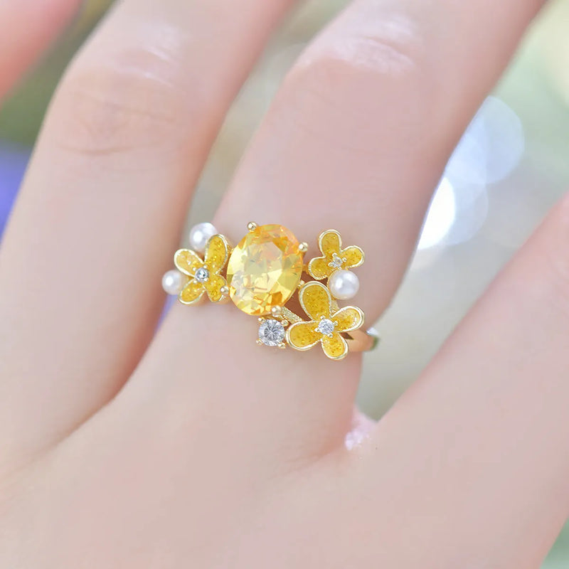 Women's flower pearl high-grade zircon open ring, adjustable opening design in metal with electroplated yellow or light purple finish, cream sweet girl style fashion jewellery