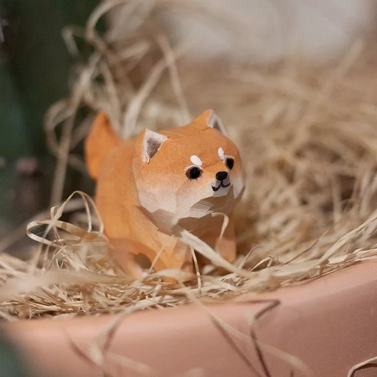 Handmade green sandalwood kitten ornament with unique design