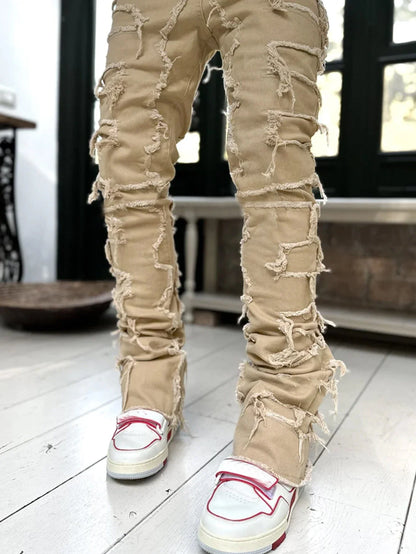 Stylish patched men's jeans with tight, stacked fit and variety of vibrant color options