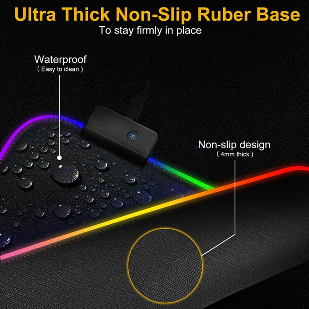 Black RGB gaming mouse pad with illuminated surface measuring 900x400mm and 4mm thickness