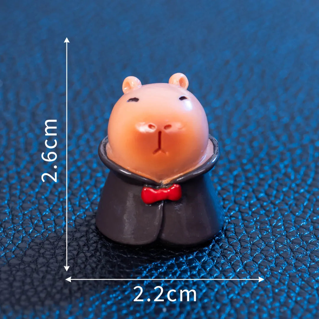 Eight Halloween character capybara resin decorations including pumpkin, zombie and vampire designs