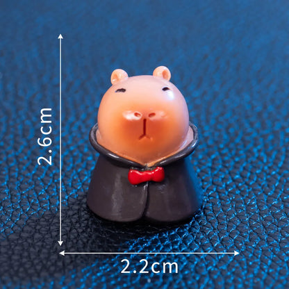 Eight Halloween character capybara resin decorations including pumpkin, zombie and vampire designs