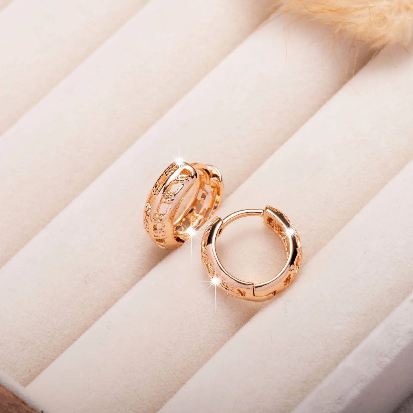 Copper heart and leaf shaped earrings with hollowed-out design and rose gold finish