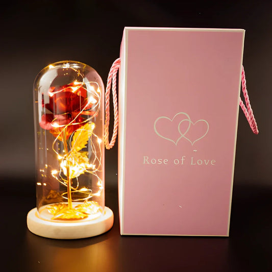 Little Prince rose arrangement under 20x9cm glass dome with gold foil flowers