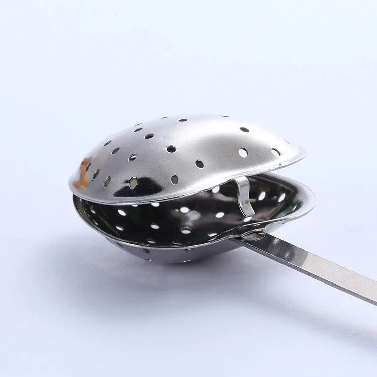 Premium stainless steel tea infuser with heart-shaped design, suitable for brewing loose-leaf teas, herbs, and spices