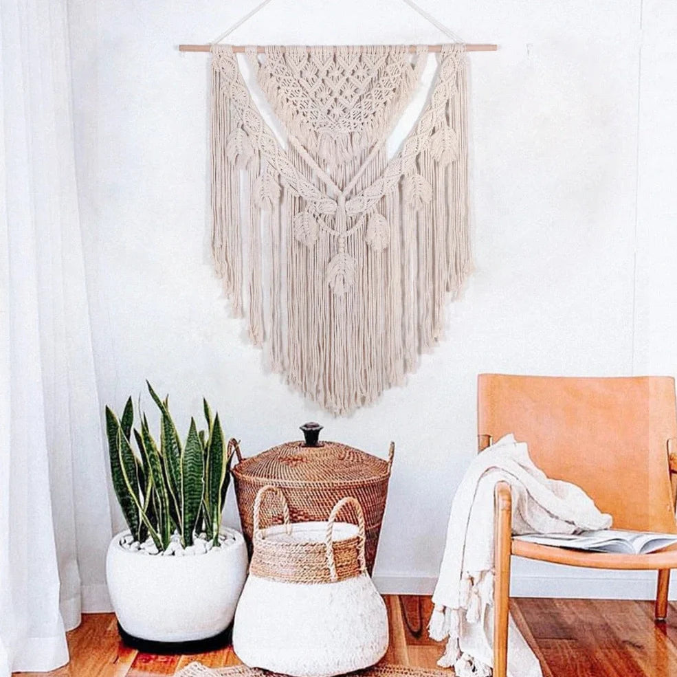 Beige hand woven cotton tapestry 115x100cm hanging on living room wall, textured weave detail