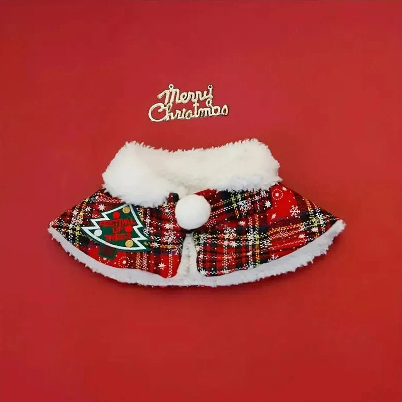 Pet wearing Christmas scarf with snowflake pattern, showing adjustable fit and holiday design details