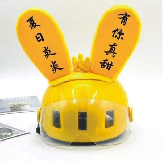 Rabbit ear ski helmet ornament with LED lighting and Velcro base attachment for helmet customisation