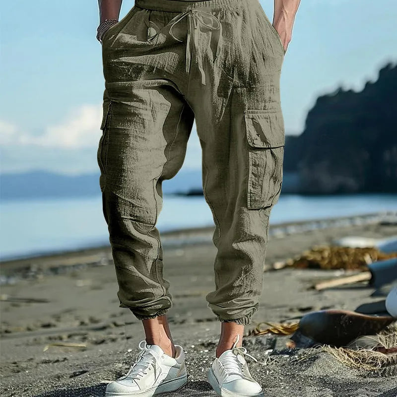 Men's linen trousers with ankle ties and multiple pockets in solid colour
