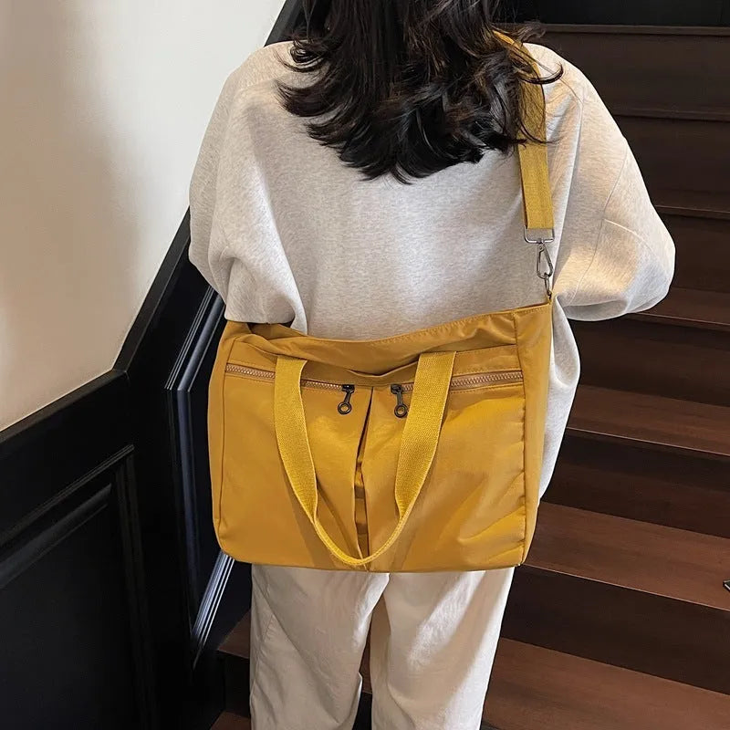 Large capacity solid colour Oxford cloth messenger bag with breathable ultra-light design
