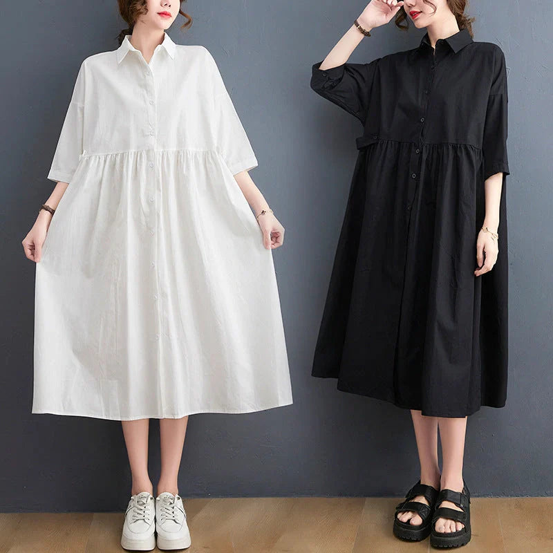 Chic casual loose dress in white and black colors with polo collar and short sleeves, made of premium linen fabric for a relaxed and comfortable fit
