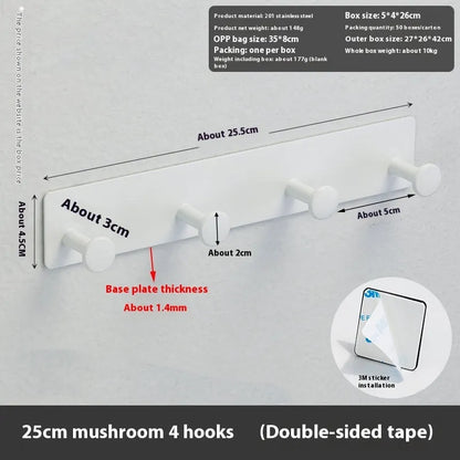 Screwless mushroom-style clothes hook with adhesive backing, shown in white on a tiled wall.