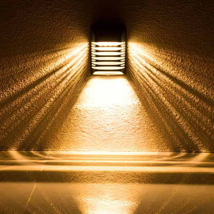 Black solar wall lamp with polycrystalline silicon panel measuring 90x20x53mm for outdoor garden lighting