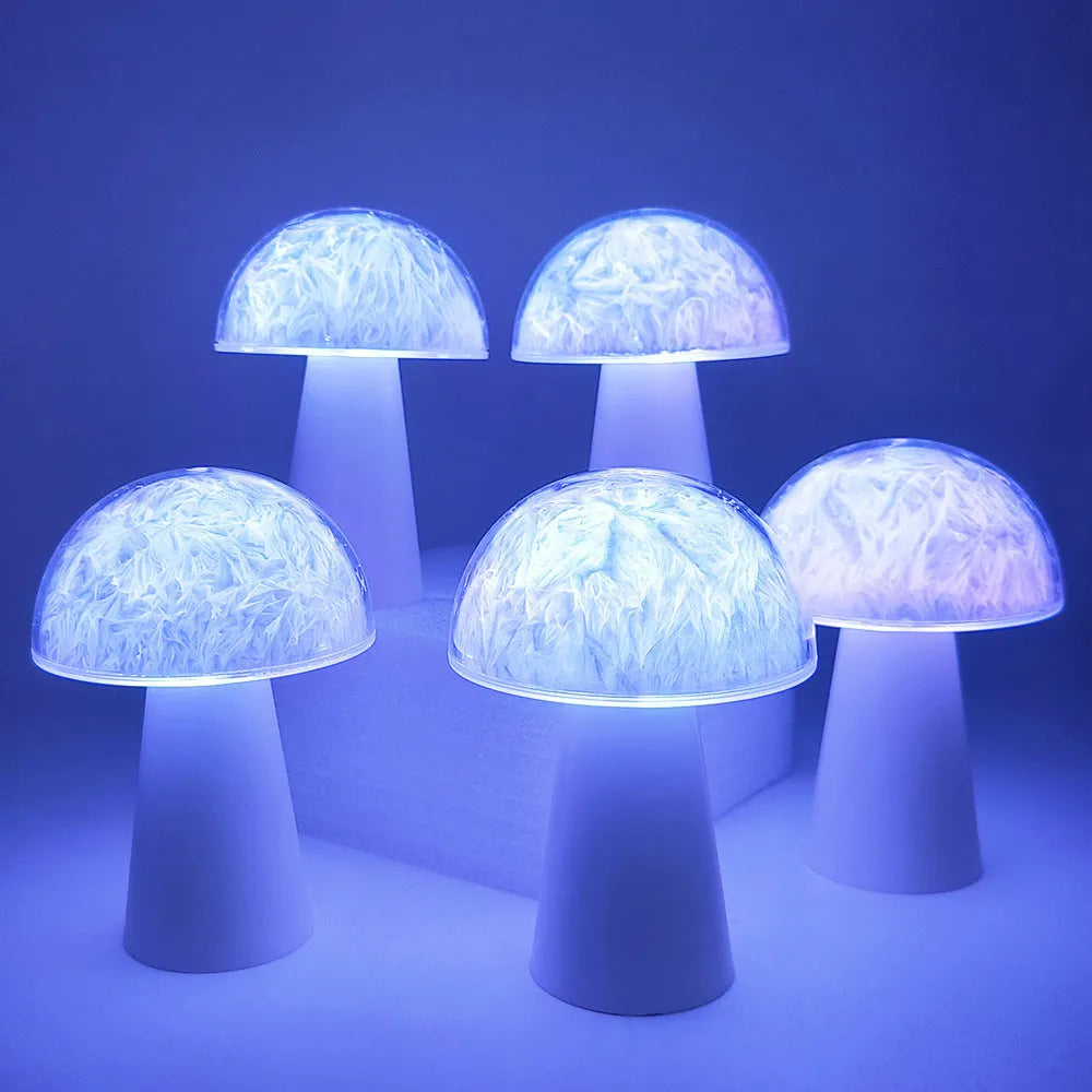 Mushroom-shaped RGB colour-changing night light with remote control on a wooden surface