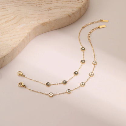 Women's stainless steel bracelet with 18K gold plating and geometric design