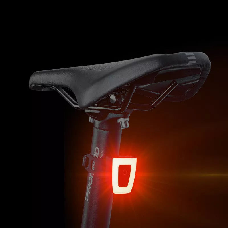 USB rechargeable bicycle helmet and seat tube warning taillight in white and black