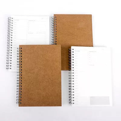 Compact daily planner with kraft paper cover and wood-free paper pages