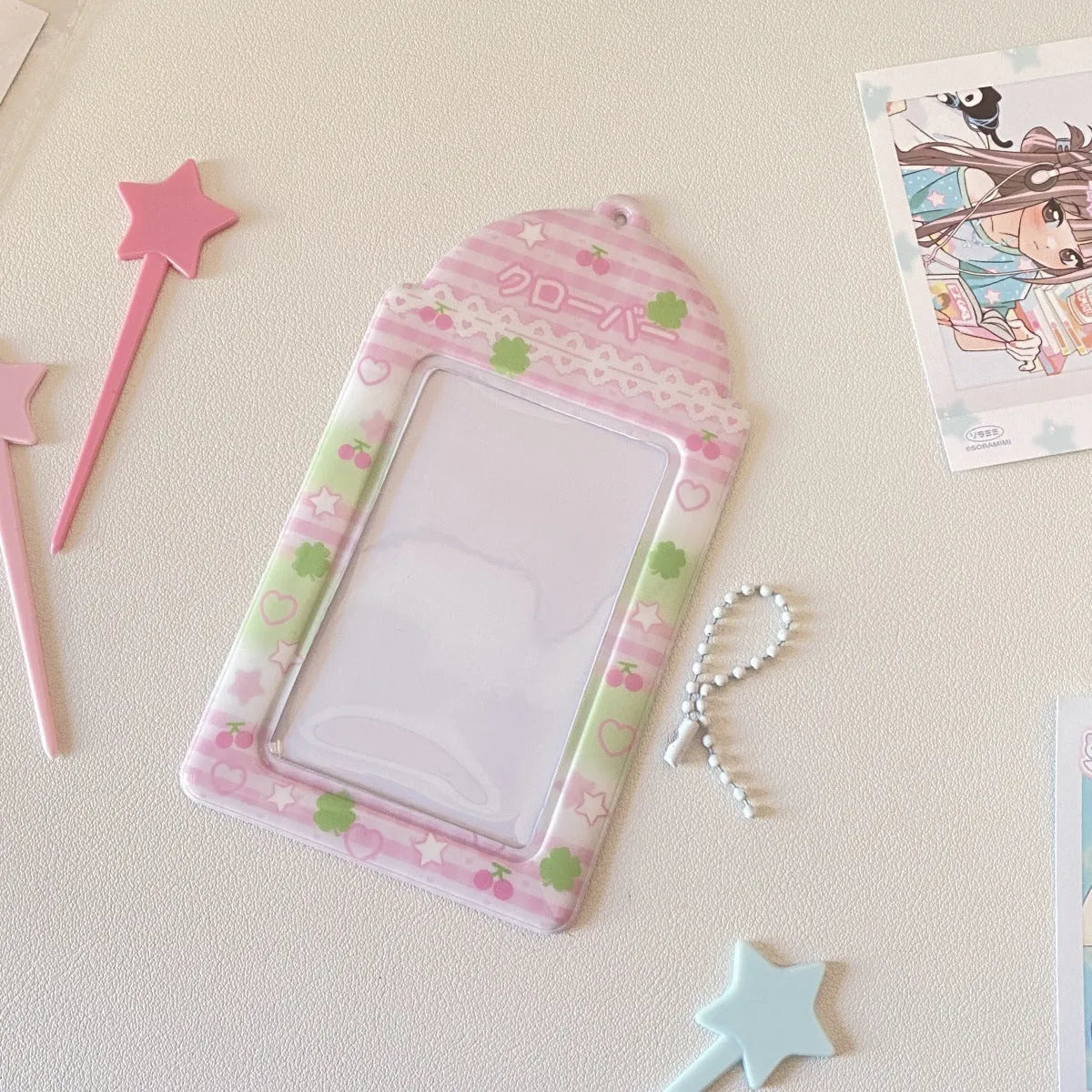 Cartoon plaid strawberry PVC card holder measuring 7.6 by 13.6 centimetres with lanyard attachment