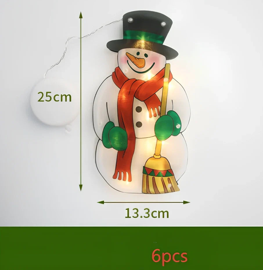 LED Christmas hanging lights with suction cups showing snowman design illuminated on window