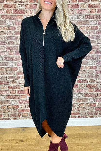 Women's solid colour loose fit knitted dress with raglan sleeves and a front zipper.