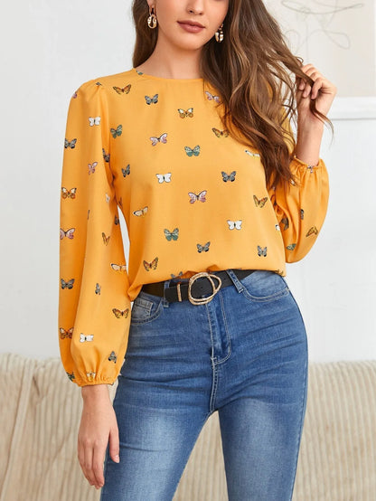 Women's loose fit long-sleeved shirt with colourful butterfly print in green colour option