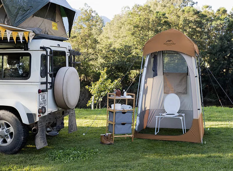 Single Person Folding Changing Shed in dark brown, offering privacy and sun protection outdoors