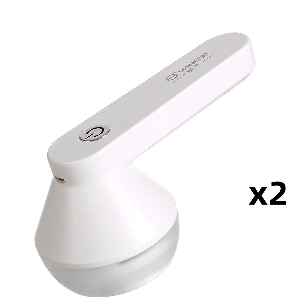 White and green charging shaving machine with straight plug design measuring 13.5cm