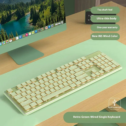 Prewalker V3 retro green mechanical feel keyboard and mouse set on a desk.
