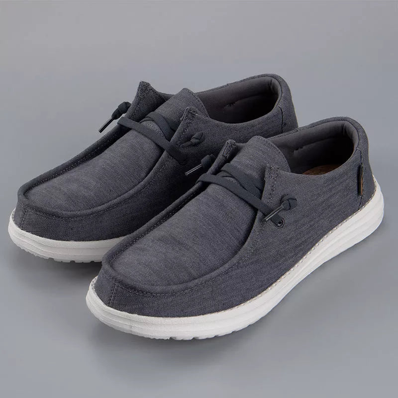 Men's casual canvas loafers in various colors with breathable design and shock-absorbing sole