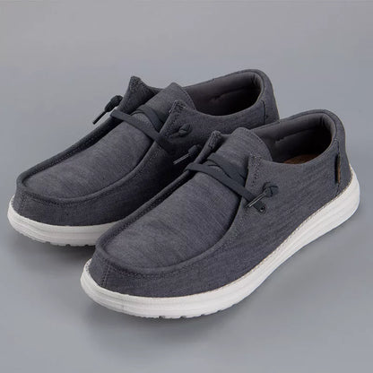 Men's casual canvas loafers in various colors with breathable design and shock-absorbing sole