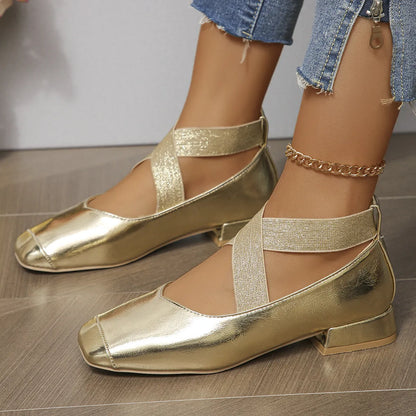 Women's gold slip-on square-toe evening pump with a low rubber heel, shown as a reusable overshoe.