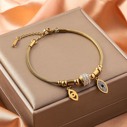 Titanium steel inlaid shell bracelet with electroplated finish showing pattern variation options