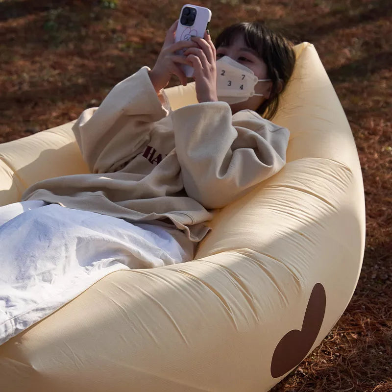 Portable inflatable sofa for outdoor camping, durable and waterproof, supports 150kg